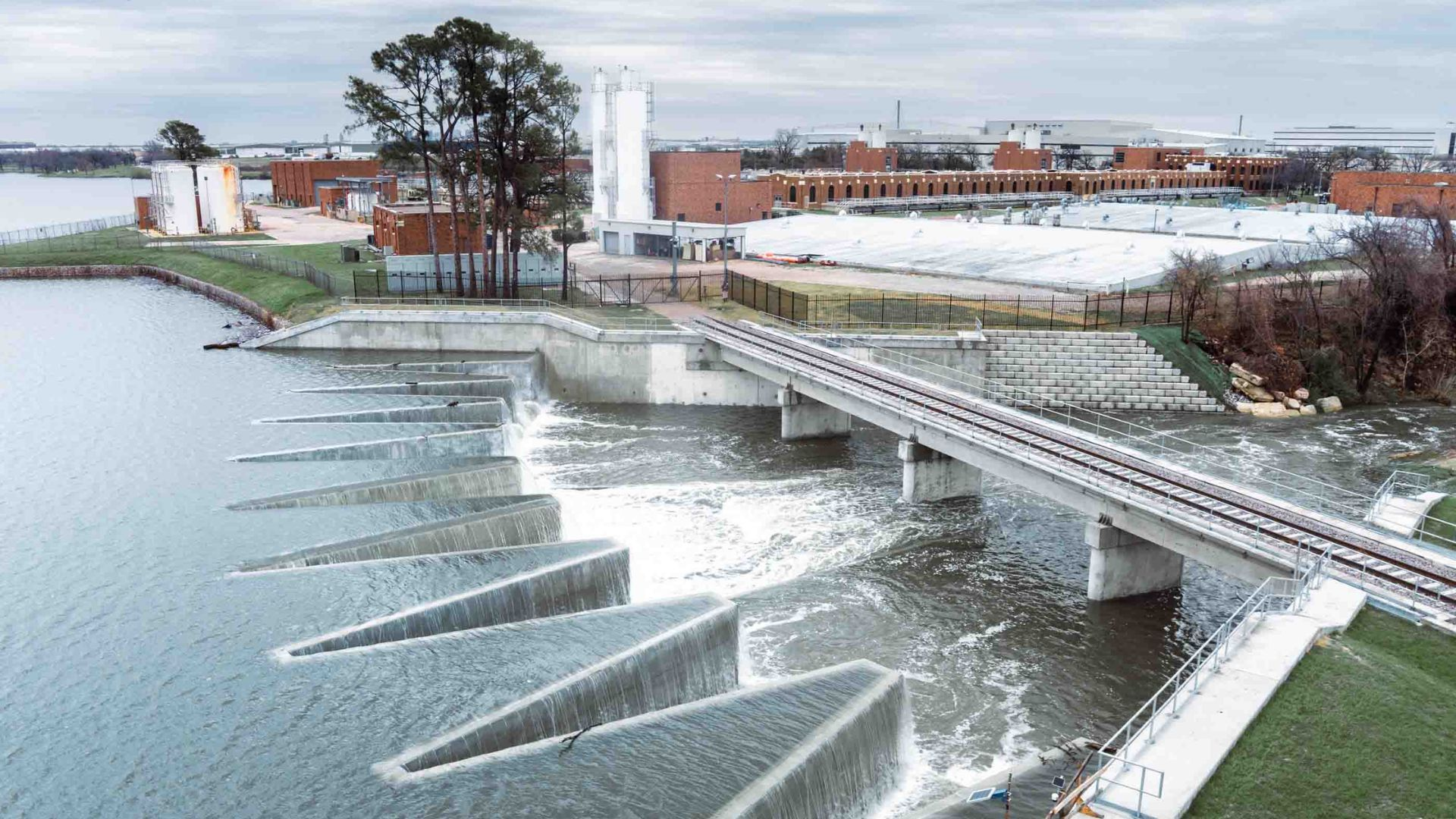 City of Dallas officials celebrate updated Bachman Lake Dam and Spillway with a ribbon cutting ceremony
